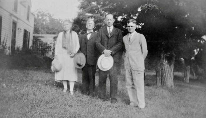 (L to R) Susan L Strickland (Norburn), Charles A Norburn, Fred Arnett, Russell L Norburn. 1910 (est)